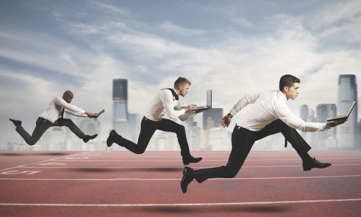 Competition in business concept with running businesspeople